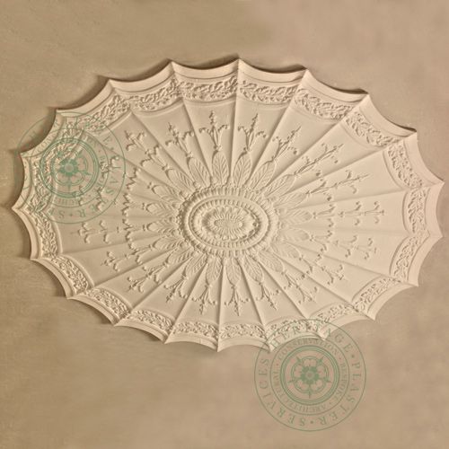Large Adams design oval ceiling centrepiece with plain open flutes, small fluted enrichment and ornate central boss. Dimensions: 1300mm by 910mm
