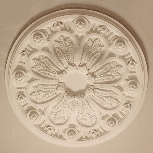 CR19 Ceiling Rose is a medium rose with wheat sheaf enrichment and raised beeded patra to outer banding. 