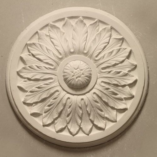 CR22 Ceiling Rose is a small fibrous plaster moulding with alternating leaf enrichment and plain outer banding. Dimensions: 450mm