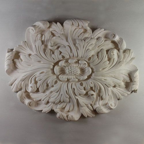 CR24 Ceiling Rose is a medium oval leaf rose with sinuous leaf design and ornate central boss. A standard fibrous plaster moulding. Dimensions: 600mm/415mm