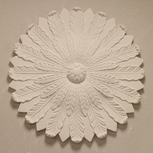 CR26 Ceiling Rose is a small fibrous plaster ceiling centre with a palmetter pattern and no outer edge moulding. Dimensions: 430mm