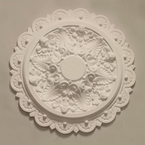 CR25 Ceiling Rose is a small rose of very ornate design with alternating leaf and half round patra and dart to outer banding. Dimensions: 455mm